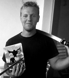 The prolific author at home, sword in hand.